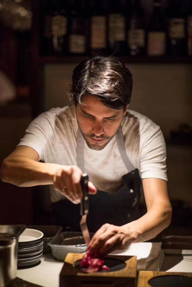 Chef preparing salumi